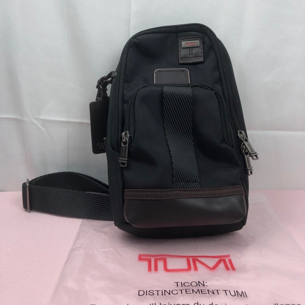 TU.MI SLING BAG In black